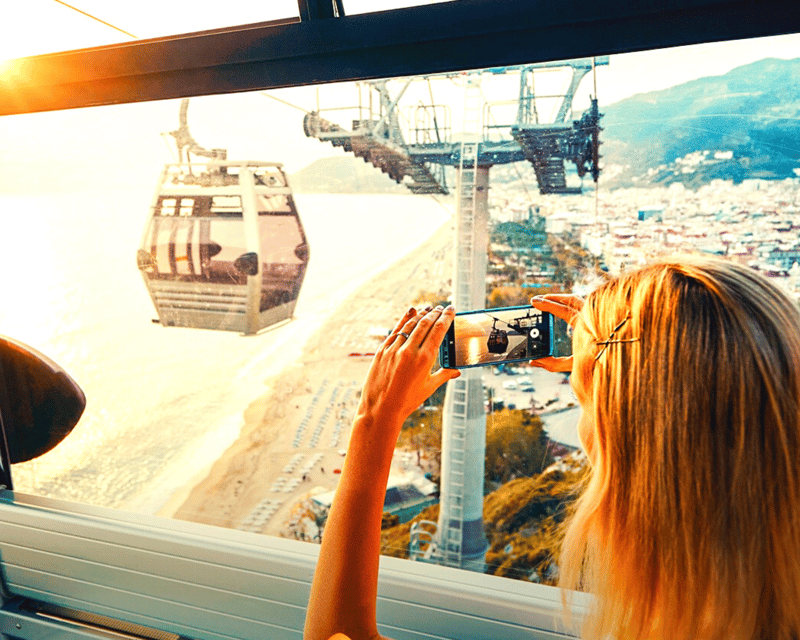 Alanya 4-Hour City Tour: Castle, Cave, & Sunset Panora - Climbing toward Alanya Castle by bus or cable car