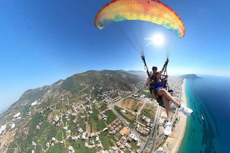 Alanya: Tandem Paragliding with Beach and Castle Views - Preparing for takeoff in the Taurus foothills
