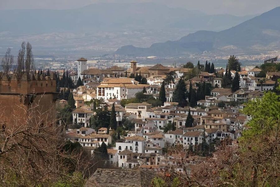Alhambra: complete tour with Nasrid Palaces, official tour guide, and tickets - The Alcazaba: walls, soldiers, and Granada views