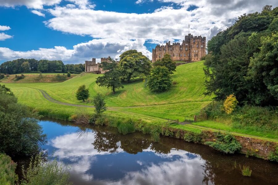 Alnwick Castle and Scottish Borders Tour from Edinburgh - Bamburgh: beach, village, and a castle on the rock