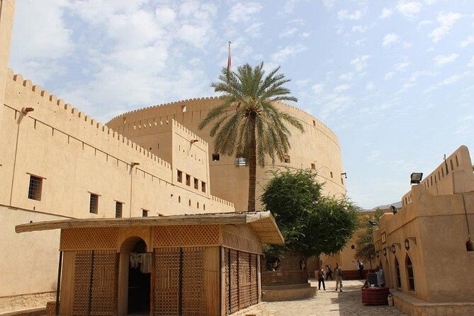 Amouage & Nizwa Full-Day Tour: Fort, Souq & Barakat Al Mouz - Nizwa Fort and the story inside its walls