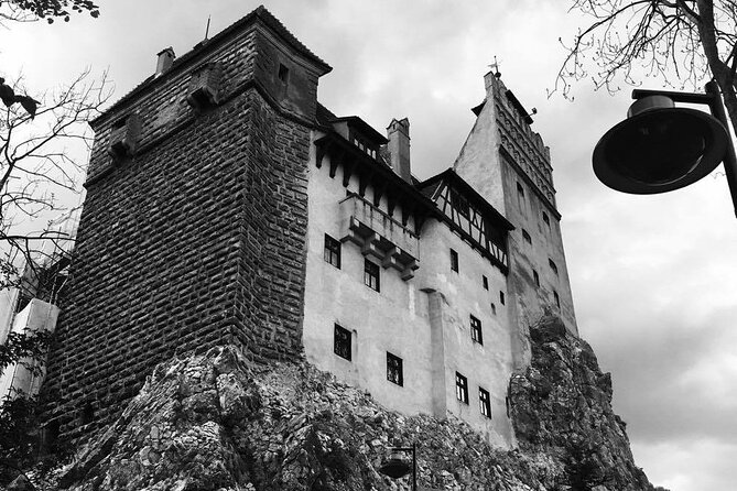 Bear Sanctuary and Bran Castle from Brasov - Bran Castle: atmosphere, stairs, and Dracula