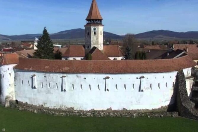 Bran Castle, Rasnov Fortress, Harman & Prejmer Fortified Churches Day Tour - Harman Church and its tall Romanesque tower