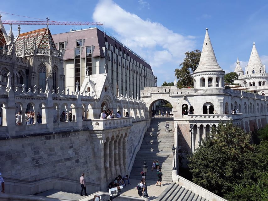 Budapest: Buda Castle Walking Tour & Folk Music Performance - Matthias Church and the heart of Castle Hill