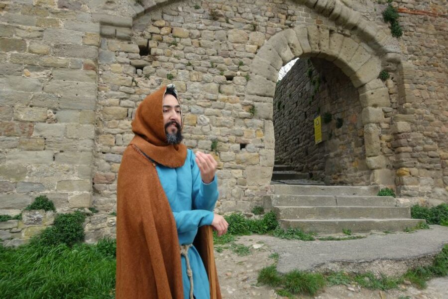 Carcassonne: Medieval Builder-Themed City Tour with a Guide - The basilica exterior and daily life