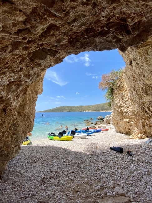 Caves of Porto Palermo: Kayak/SUP Tour with Castle Sea View - Across the bay to steep cliffs and quiet shore