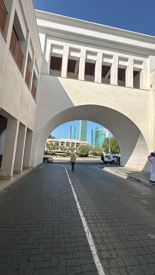 Discover Bahrain: Private Guided City Tour with Lunch - Walking through Bahrain Fort and its trading past