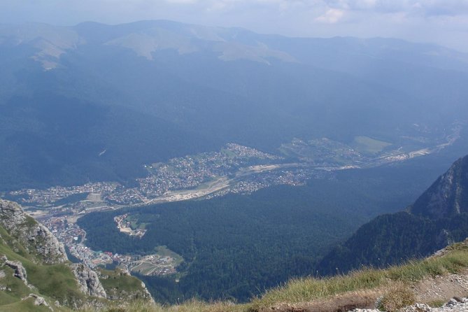Dracula and Peles Castles Premium Tour with Hotel pick-up - Prahova Valley brings mountain scenery before the castles