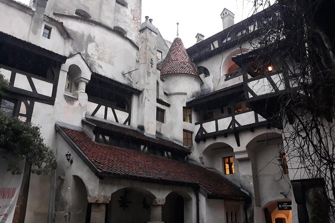 Dracula's Castle & Peles Palace Tour from Bucharest Including Brasov Old Town - Bran Castle: separating Dracula from the real fortress