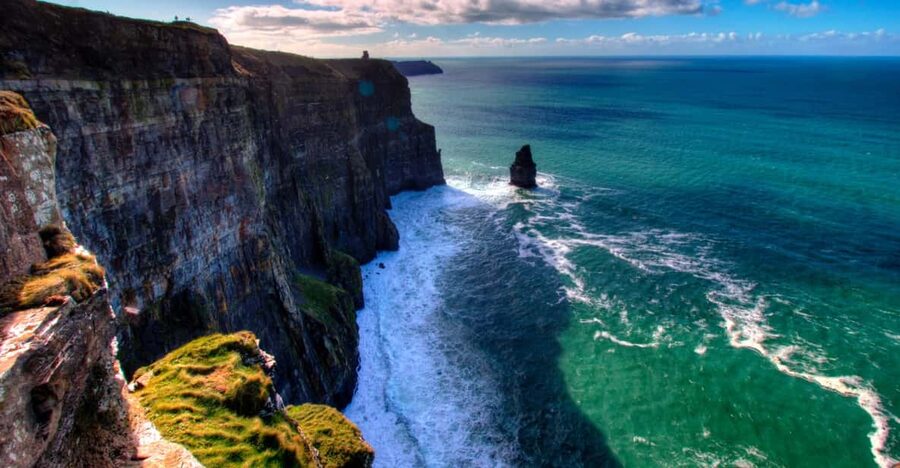 Dublin: Cliffs of Moher, Ennis, & Bunratty Castle Day Tour - Facing the Atlantic at the Cliffs of Moher