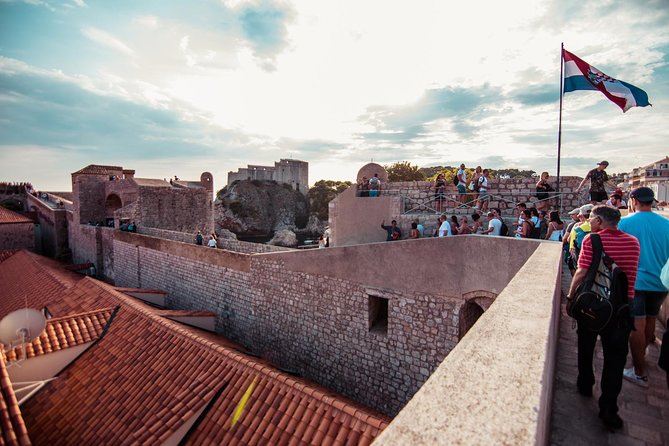 Dubrovnik: Ancient City Walls & Wars Walking Tour - The war stories and local perspective