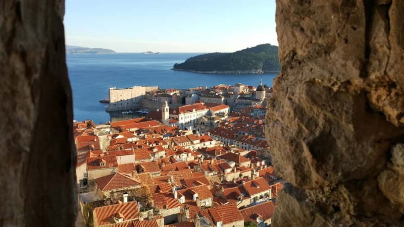 Dubrovnik City Walls: Small-Group 2-Hour Tour With a Local - Meeting at Ploče Gate and looking over the harbor