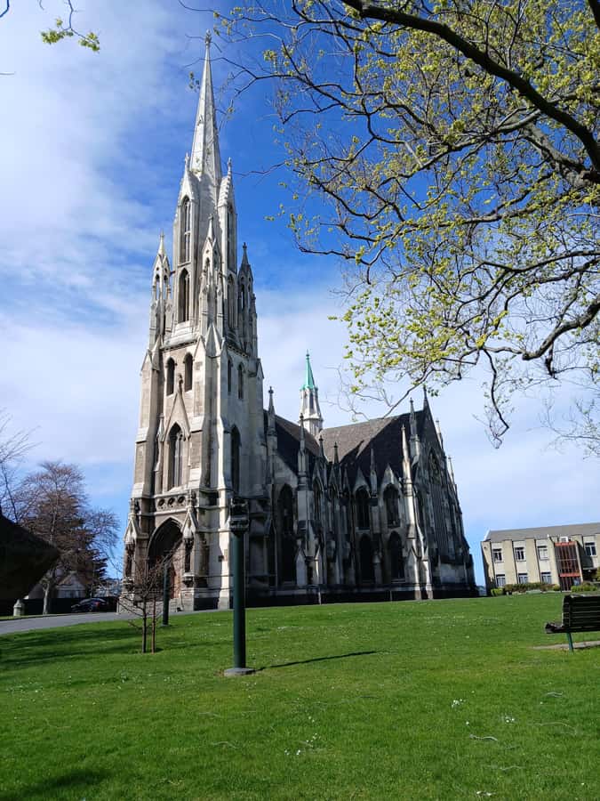 Dunedin: Peninsula with Lanarch Castle gardens & Olveston - The university, First Church, and railway station