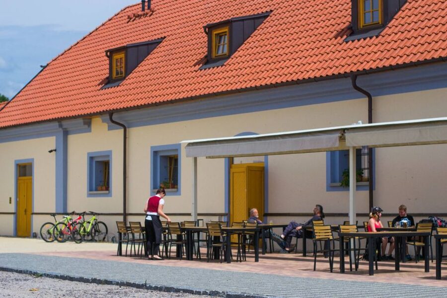 E-Bike Day Trip: Visit a Roman Castle and Taste Craft Beer - Karlstejn Castle after the riverside ride
