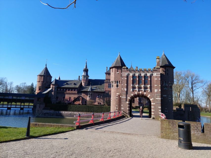 From Amsterdam: Castle De Haar Guided Tour - Timing, languages, and cancellation flexibility