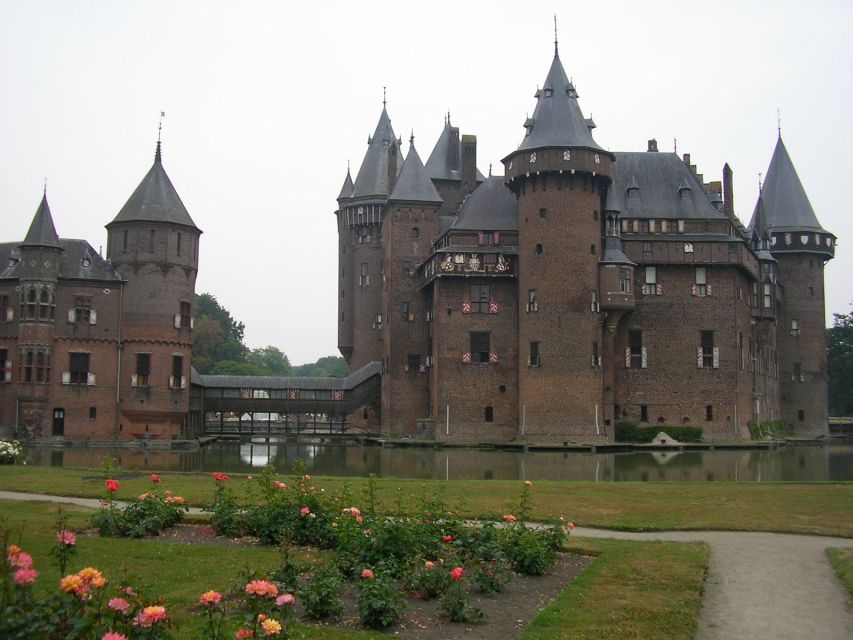 From Amsterdam: Private Day Trip to the Dutch Castles - Muiden Castle and its drawbridge entrance