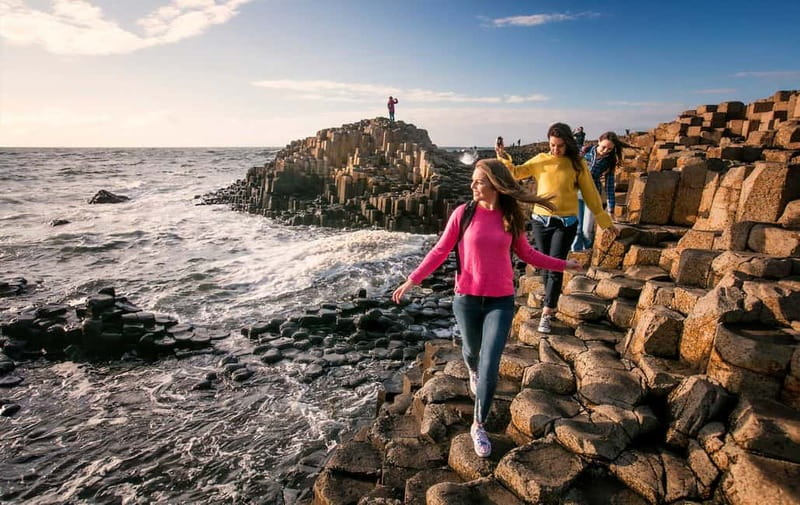 From Belfast: Giant's Causeway Guided Day Tour With Castles - Following the Antrim Coast Road