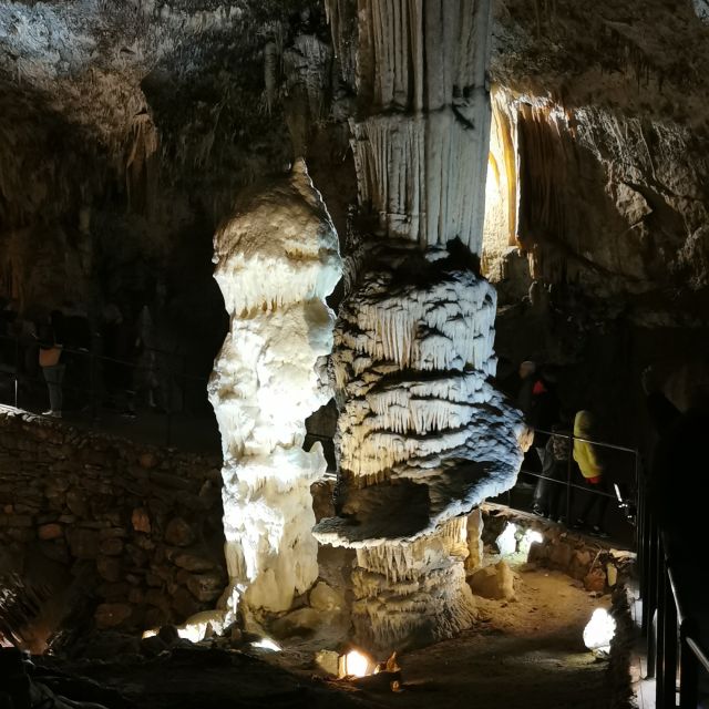 From Ljubljana: Postojna Cave & Predjama Castle Guided Trip - Predjama Castle Built Into the Rock