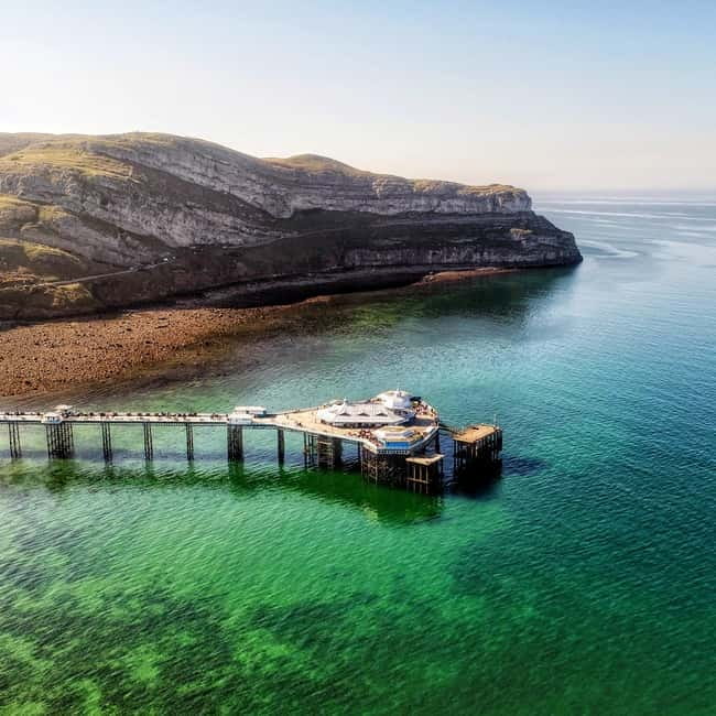 From Llandudno: Portmeirion, Snowdonia and Castles Tour - Great Orme Road sets the tone