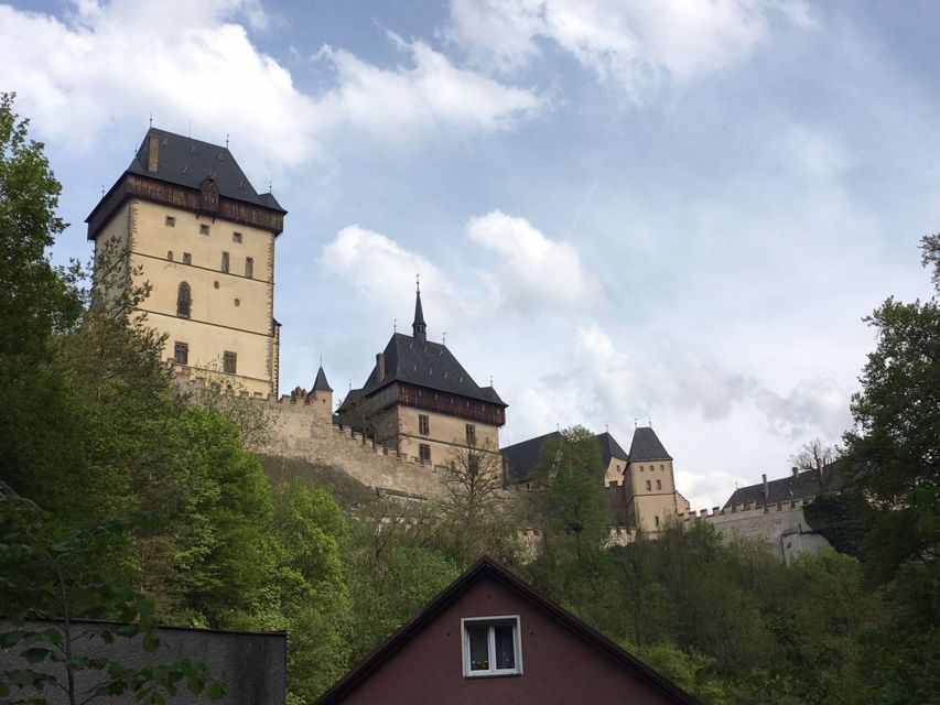 From Prague: Half-Day Karlstejn Castle Tour - Walking up to a castle built for protection