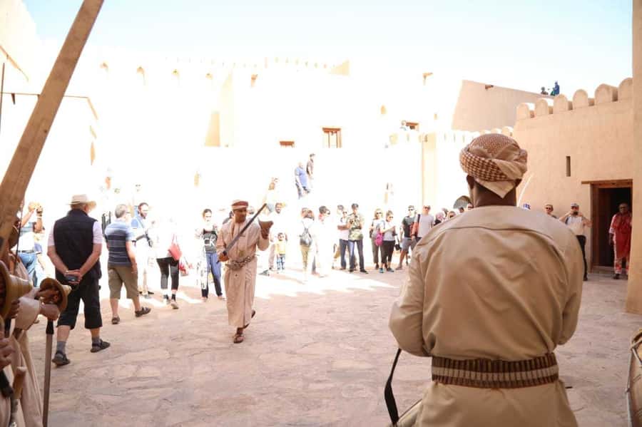 Full-Day Tour in Oman: Enchanting Forts of Nizwa and Jabreen - Bahla Fort, old walls, and a pottery workshop