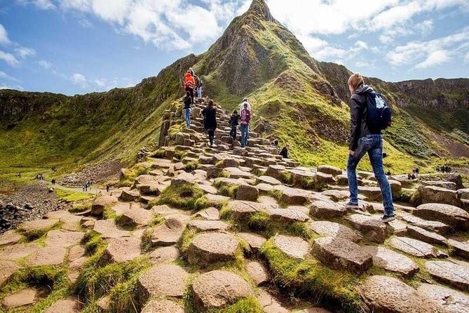 Giant's Causeway Tour from Belfast - Luxury Bus + Castles Tour - Walking the basalt columns at Giant’s Causeway