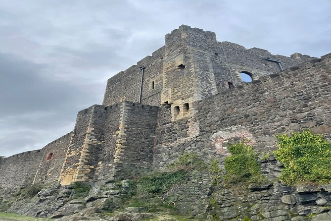 Giants Causeway, Rope Bridge, Carrickfergus Castle and Dark Hedges Tour - Dunluce Castle and the end of the day