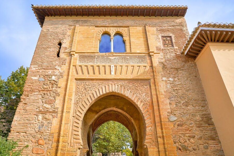 Granada: Alhambra Small Group Tour with Nasrid Palaces - Carlos V Palace: a striking change of style