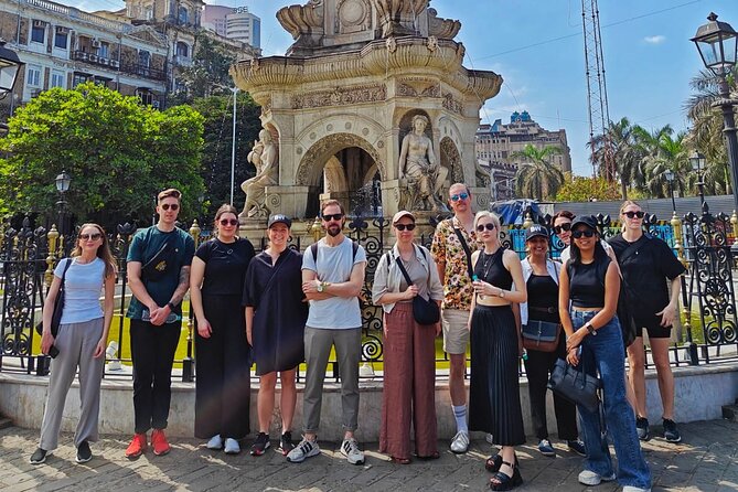 Group Guided Walking Tour in Fort and Colaba - Rajabai Clock Tower adds the university story