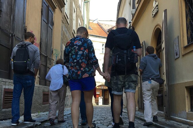 Guided City and Castle Tour from Bratislava - Old Town squares, statues, and city stories