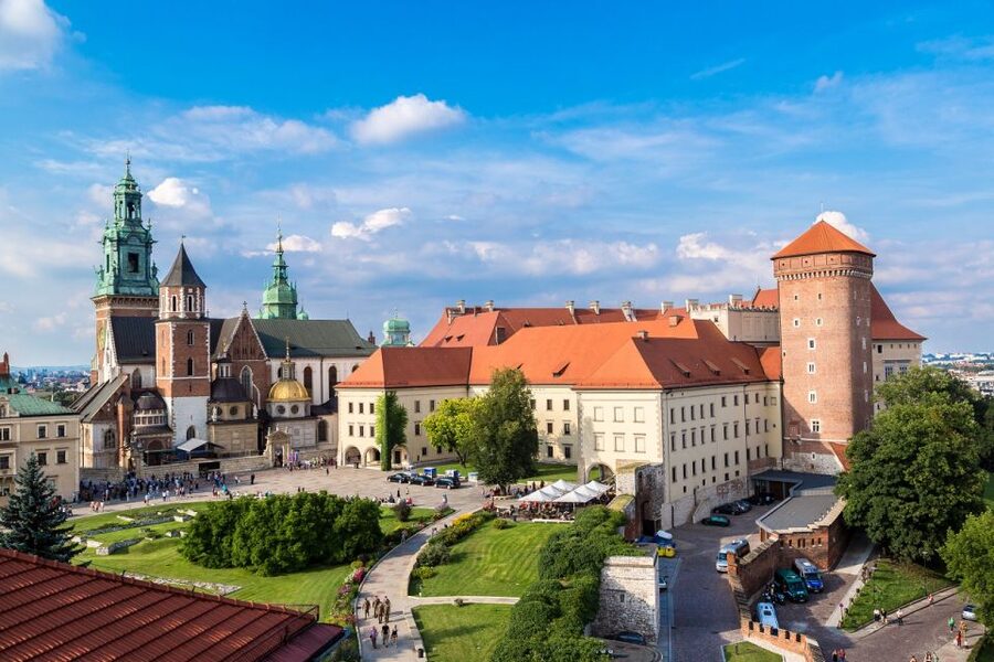 Krakow: Wawel Castle and Cathedral Guided Tour - Inside the castle, from ceremony to cultural revival