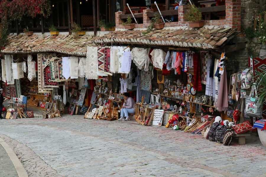 Kruja by Night: Castle & Bazaar Tour from Tirana - Walking the castle walls and learning about Skanderbeg