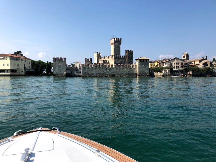 Lake Garda: Historic Castle Cruise with Wine Tasting - Torri del Benaco’s Roman and medieval fortress