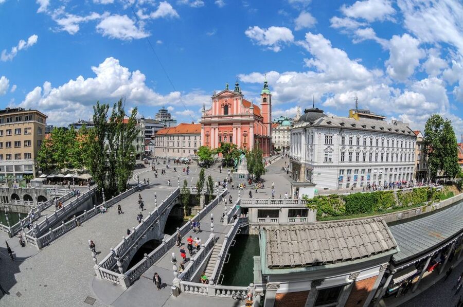 Ljubljana: Guided Walk & Funicular Ride to Ljubljana Castle - Triple Bridge, Plečnik’s Market, and the cathedral