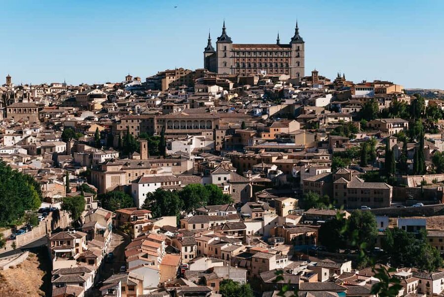 Madrid: Toledo & Segovia Tour w/ Cathedral, Alcazar & Lunch - Walking Toledo’s medieval streets