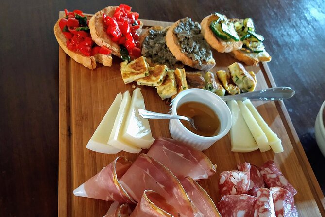 Montalcino: Brunello Wine Tasting & Lunch in a Tuscan Castle - Walking the vineyard with a sommelier