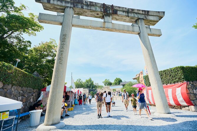 Osaka Castle Walking Tour and Castle Tower Admission - Entering the main keep and climbing for the view