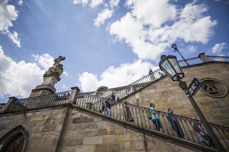 Prague: 3–Hour Castle Grounds Walking Tour and River Cruise - Taking the tram up to Castle Hill
