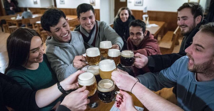 Prague: Castle Side Breweries & Pubs Guided Walking Tour - Walking through Mala Strana after dark
