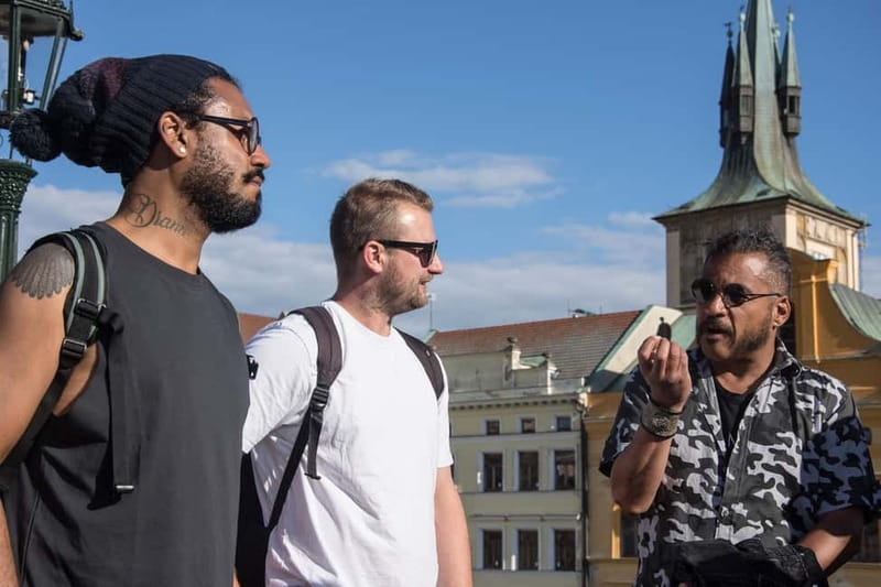 Prague: Old Town, Prague Castle & River Cruise Day Tour - Guides, group feel, and walking demands
