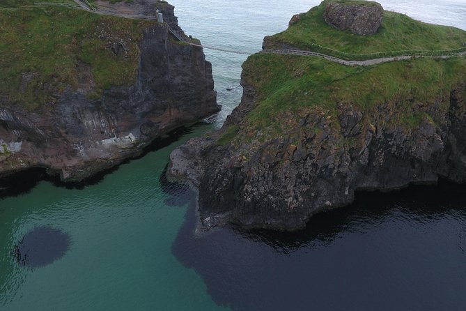 Private Tour: Giant's Causeway, Norman Castles, and Game of Thrones Film Locations - Dunluce Castle is the quick, dramatic stop
