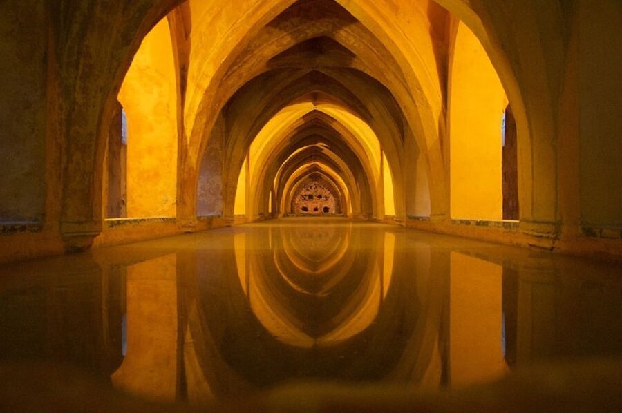 Seville: Alcázar Tour with Tickets Included - The underground cisterns and royal baths