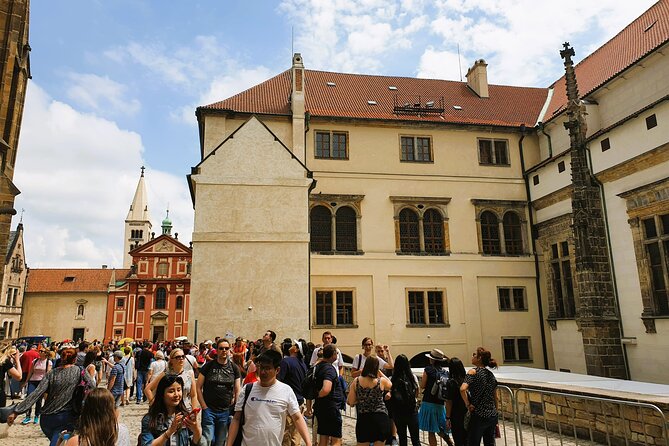 Skip the Line: Prague Castle Ticket and Introductory Overview - St. George’s Basilica offers a quieter contrast