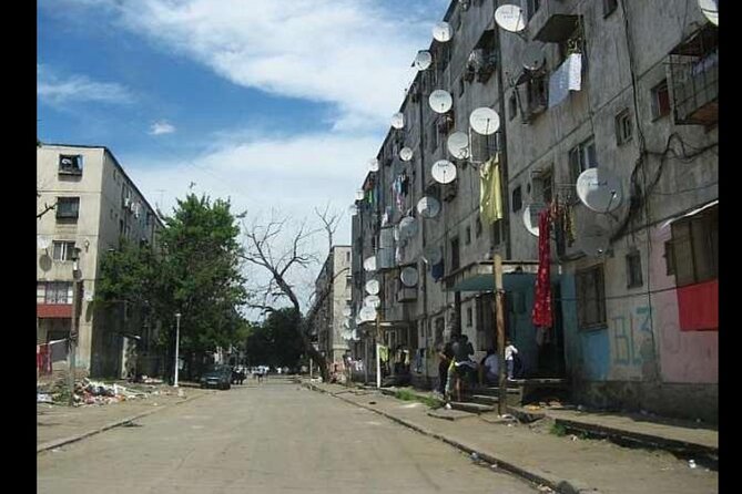 Troubled - Notorious Neighborhood - area known for social issues - Sintești: ornate homes outside the capital